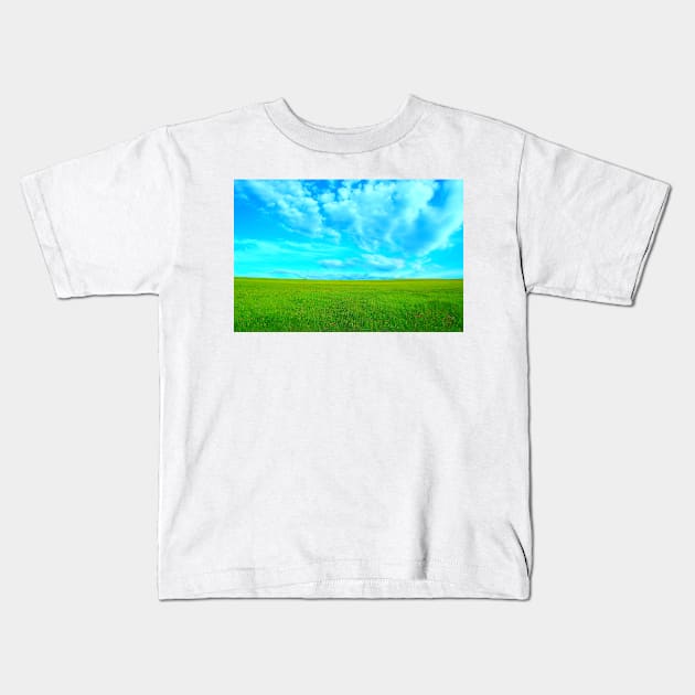 Scenery near Piani di Ragnolo with grass and sky Kids T-Shirt by KristinaDrozd